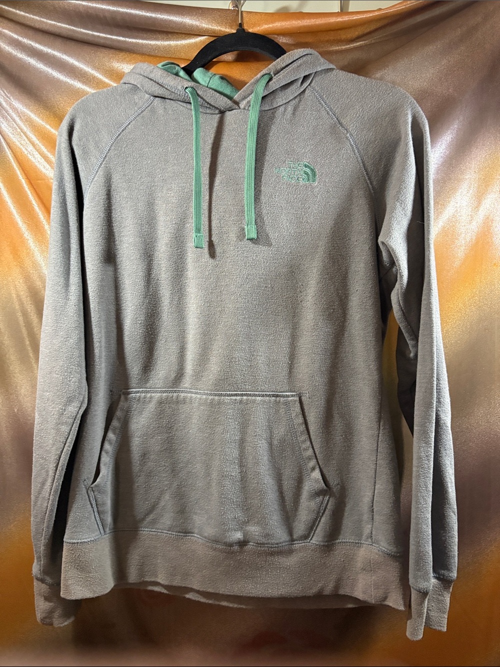 The North Face Gray Hoodie with Mint Drawcords. 137